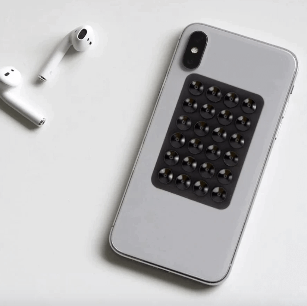 Hold-in-anywhere Magic Phone Sucker